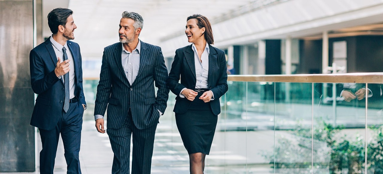 A group of businesspeople walk together