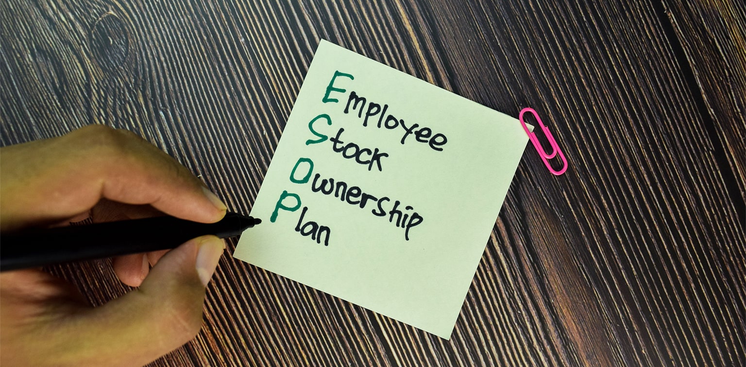 "Employee Stock Ownership Plan" being written on a sticky note