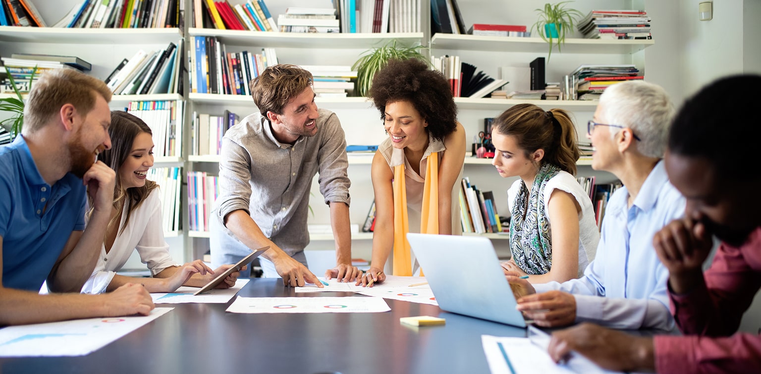 Diverse group of employees in business meeting