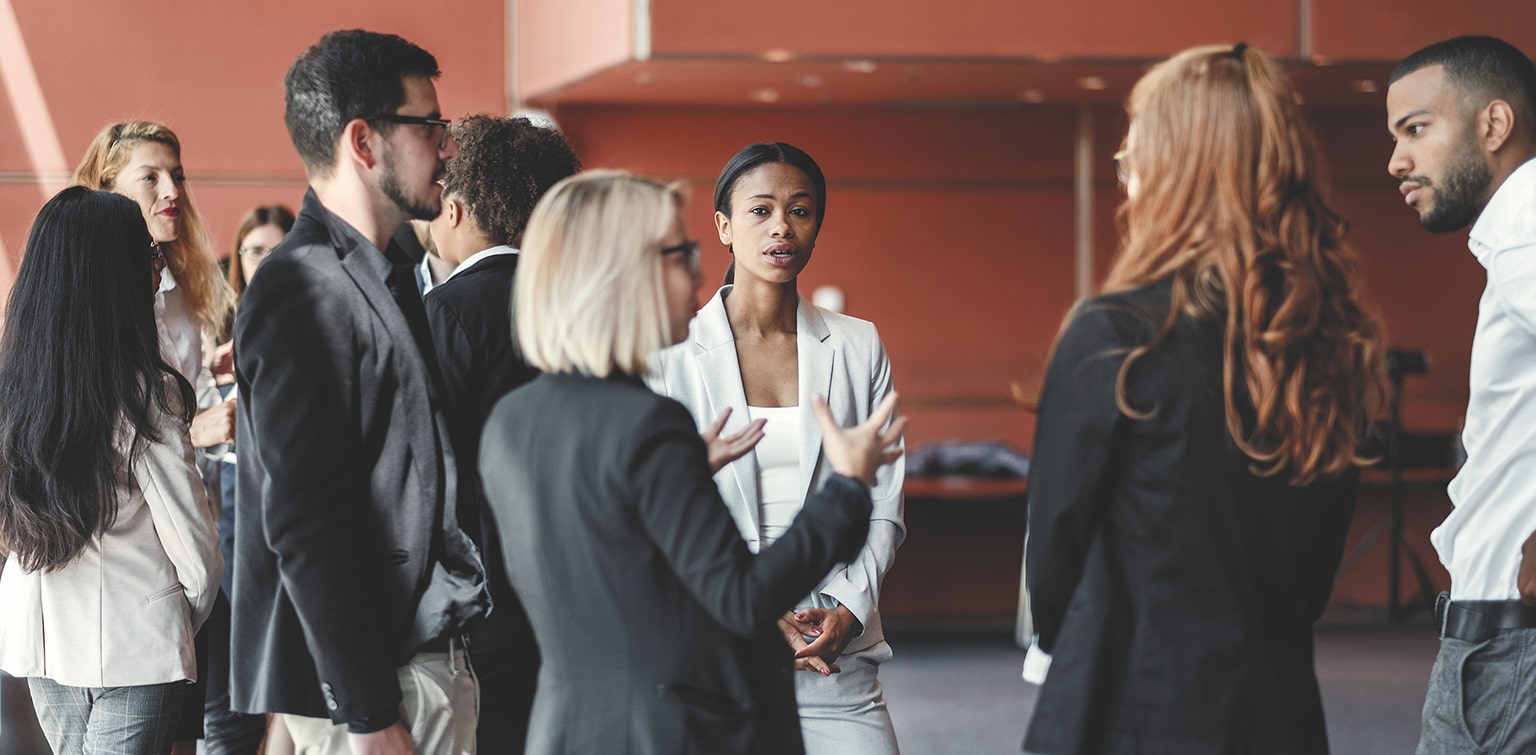 Business owners talking at networking event