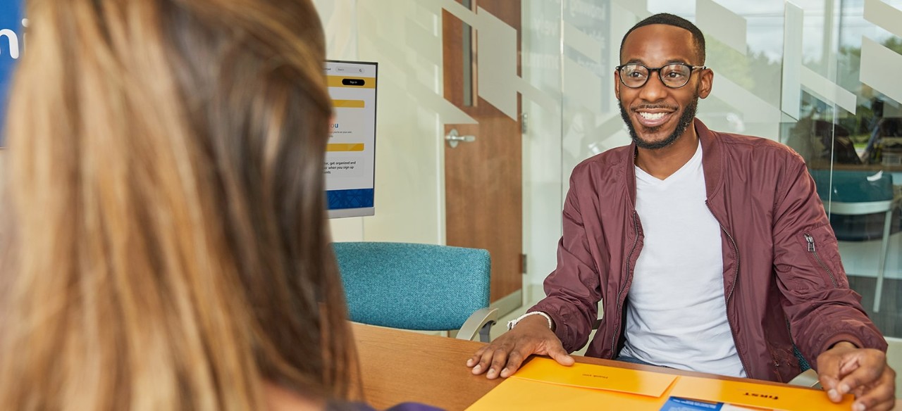 African-American man meeting with First Financial advisor 
